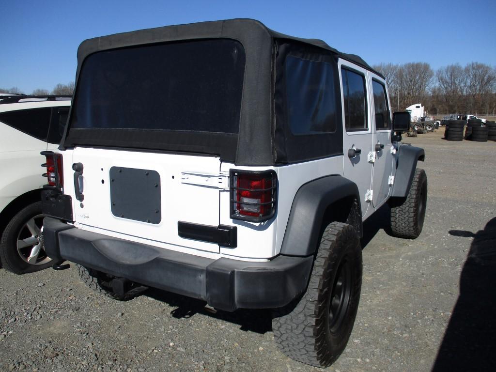 2017 JEEP WRANGLER SUV, (+/-) 104,690  4 DR, 4X4, CLOTH TOP, V6 GAS, AT, PS