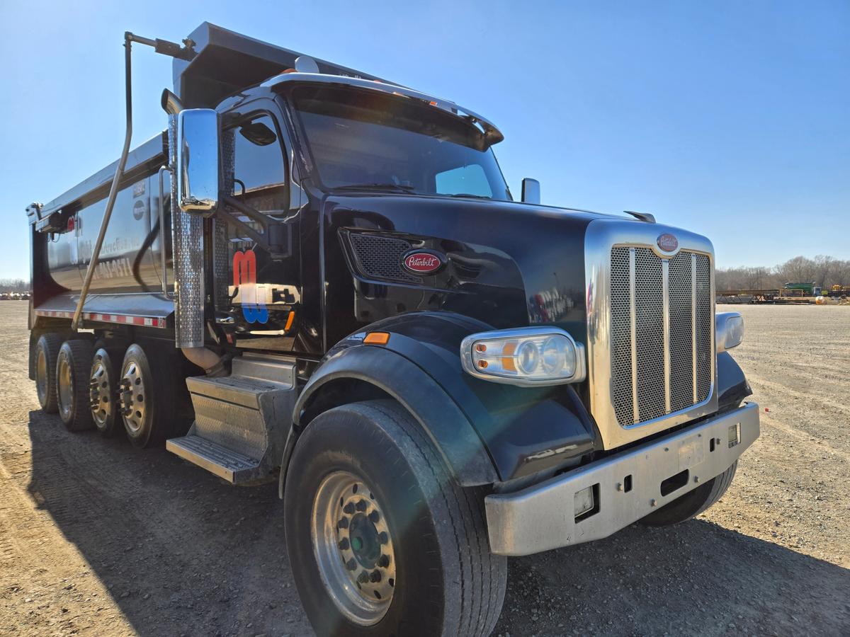 2018 PETERBILT 567 DUMP TRUCK, (+/-) 427,097  PACCAR DIESEL, AUTO TRANS, J