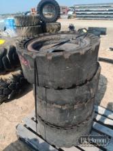 (4) Skid steer wheels & tires