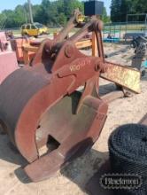 JB excavator grapple and large root rake