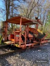 1987 RMCO 6000 ANCHOR MACH AUTO,