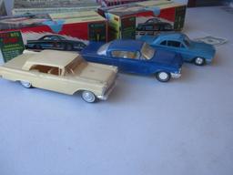 8 Unbuilt and Built Kits: The AMT 1962 Buick Convertible and CJ5 Jeep are Unbuilt.