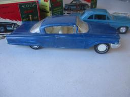 8 Unbuilt and Built Kits: The AMT 1962 Buick Convertible and CJ5 Jeep are Unbuilt.