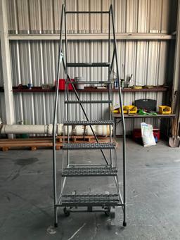 ULINE...SAFETY LADDER WITH WHEELS , APPROX 100? T