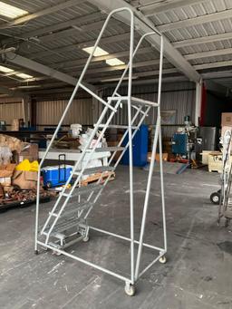 ULINE...SAFETY LADDER WITH WHEELS , APPROX 100? T