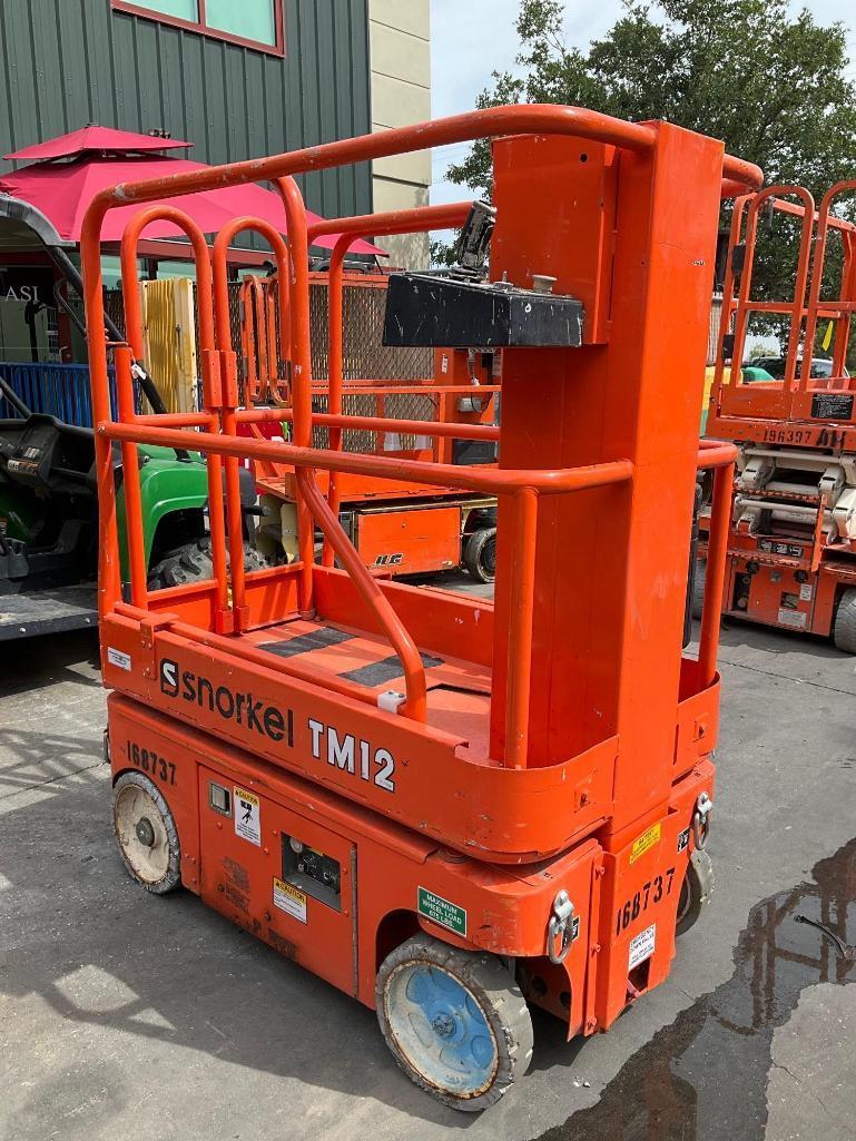 2016 SNORKEL MAN LIFT MODEL TM12 , ELECTRIC, APPROX MAX PLATFORM HEIGHT 12FT, NON MARKING TIRES,