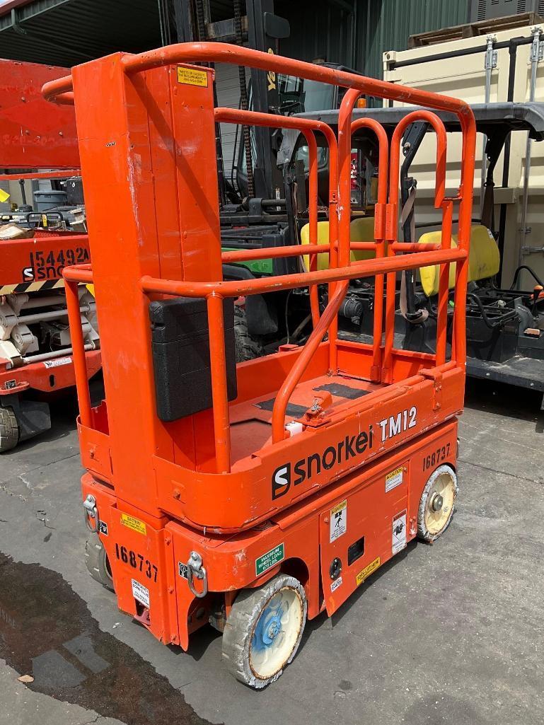 2016 SNORKEL MAN LIFT MODEL TM12 , ELECTRIC, APPROX MAX PLATFORM HEIGHT 12FT, NON MARKING TIRES,