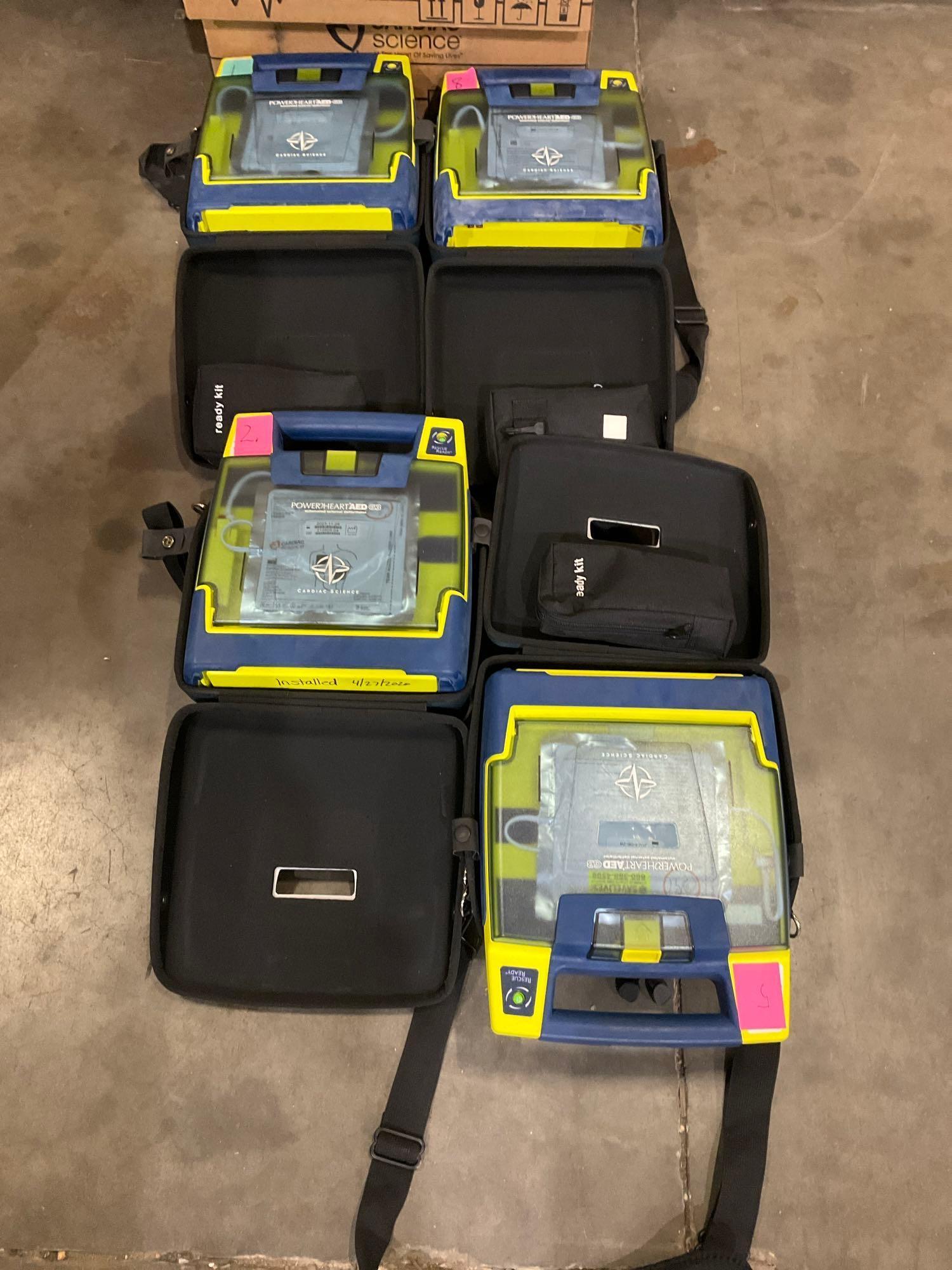 4 CARDIAC SCIENCE AUTOMATED EXTERNAL DEFIBRILLATORS...