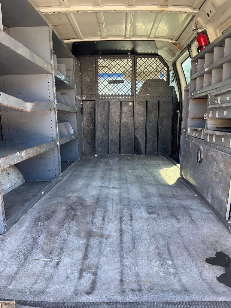 2003 FORD E-SERIES CARGO VAN, APPROX GVWR 8600LBS, STORAGE UNIT & SHELVES IN BACK , RUNS & DRIVES