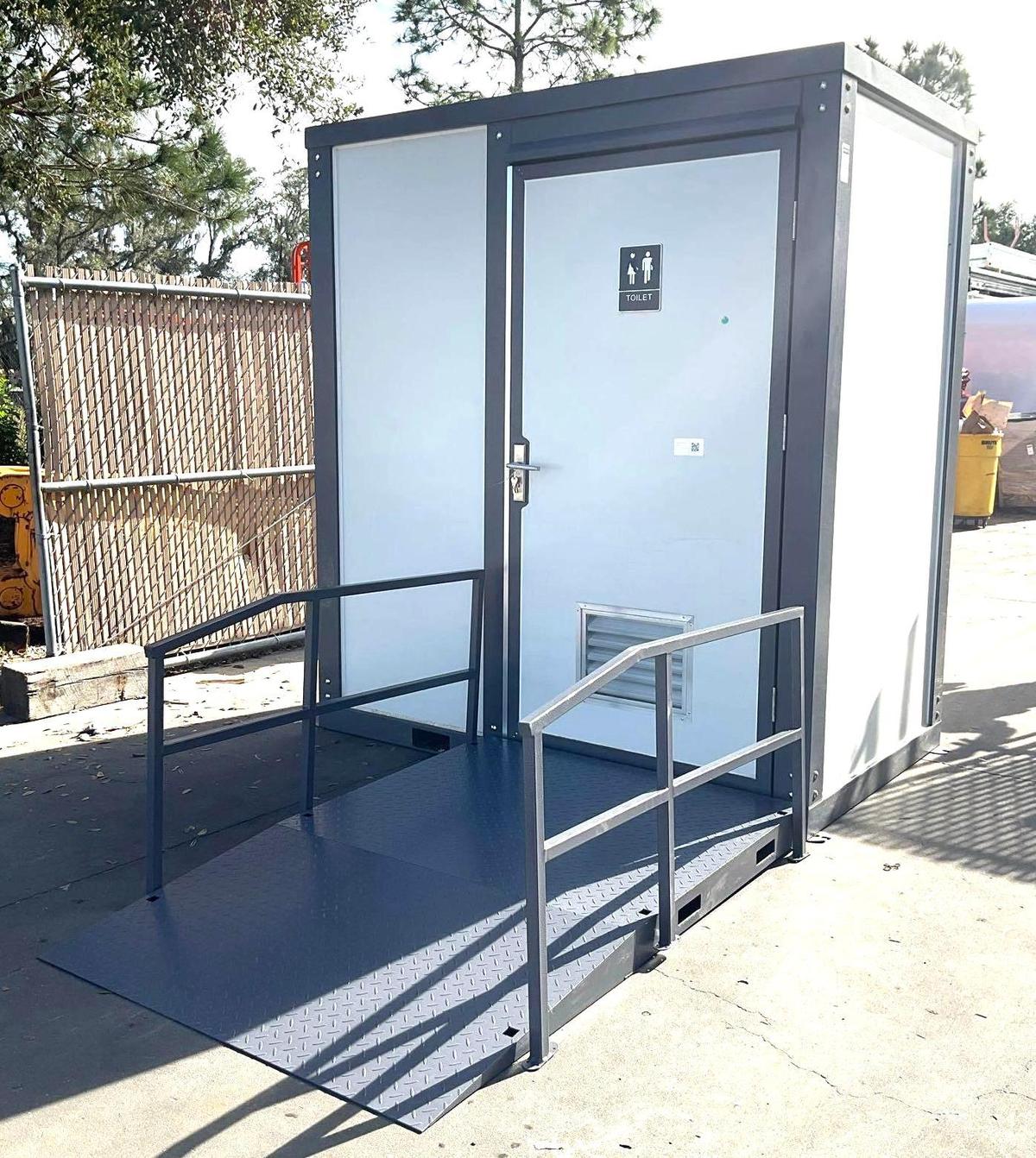 UNUSED PORTABLE BATHROOM UNIT WITH RAMP/HANDICAP ACCESSIBLE, ELECTRIC & PLUMBING HOOK UP WITH EX