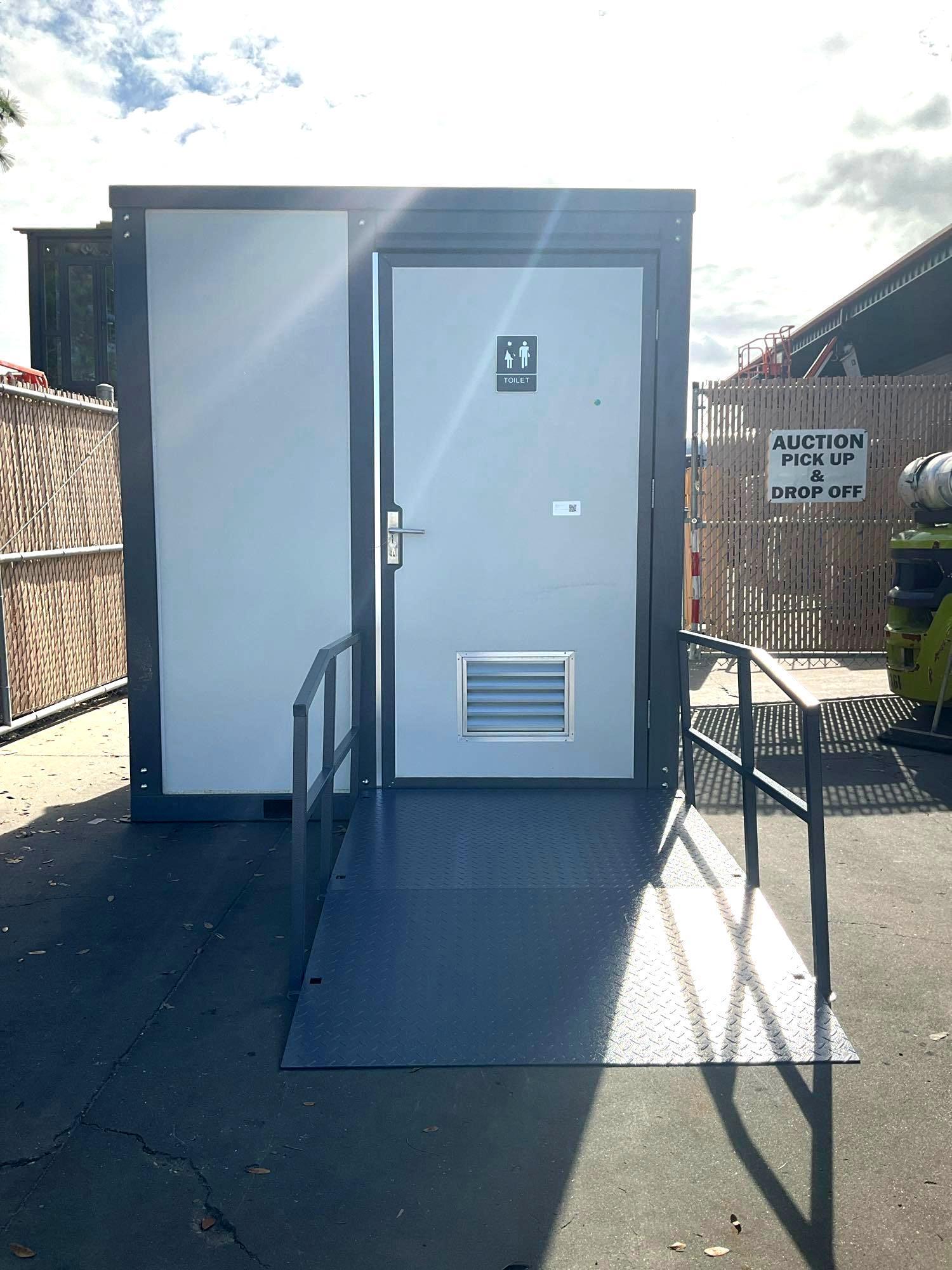 UNUSED PORTABLE BATHROOM UNIT WITH RAMP/HANDICAP ACCESSIBLE, ELECTRIC & PLUMBING HOOK UP WITH EX