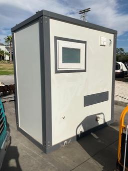 UNUSED PORTABLE BATHROOM UNIT WITH RAMP/HANDICAP ACCESSIBLE, ELECTRIC & PLUMBING HOOK UP WITH