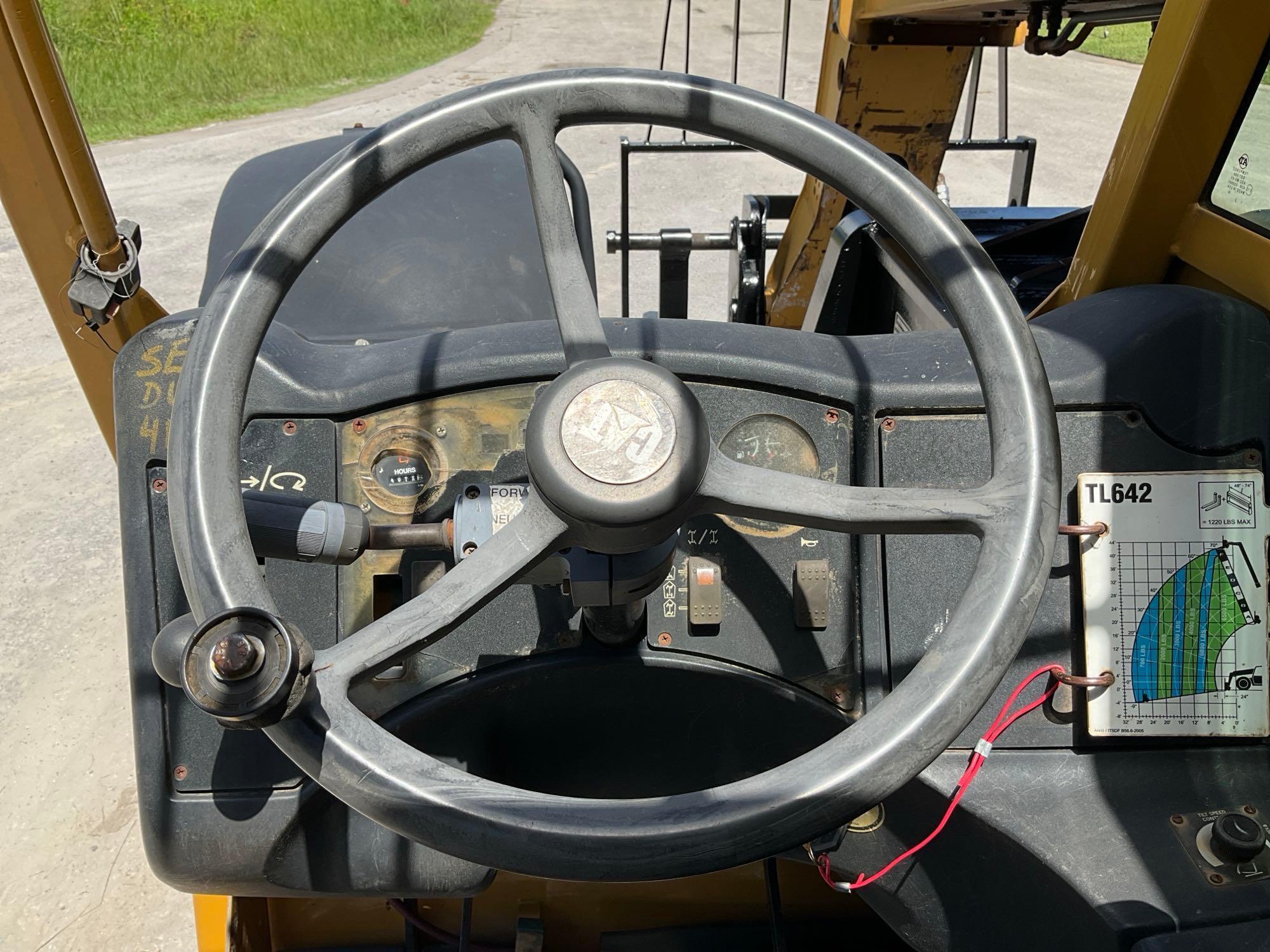 CATERPILLER...TELESCOPIC TELEHANDLER MODEL TL642, DIESEL, APPROX MAX HEIGHT 42FT, APPROX MAX REAC...