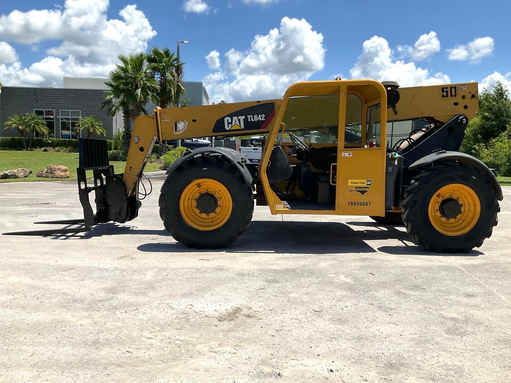 CATERPILLER...TELESCOPIC TELEHANDLER MODEL TL642, DIESEL, APPROX MAX HEIGHT 42FT, APPROX MAX REAC...