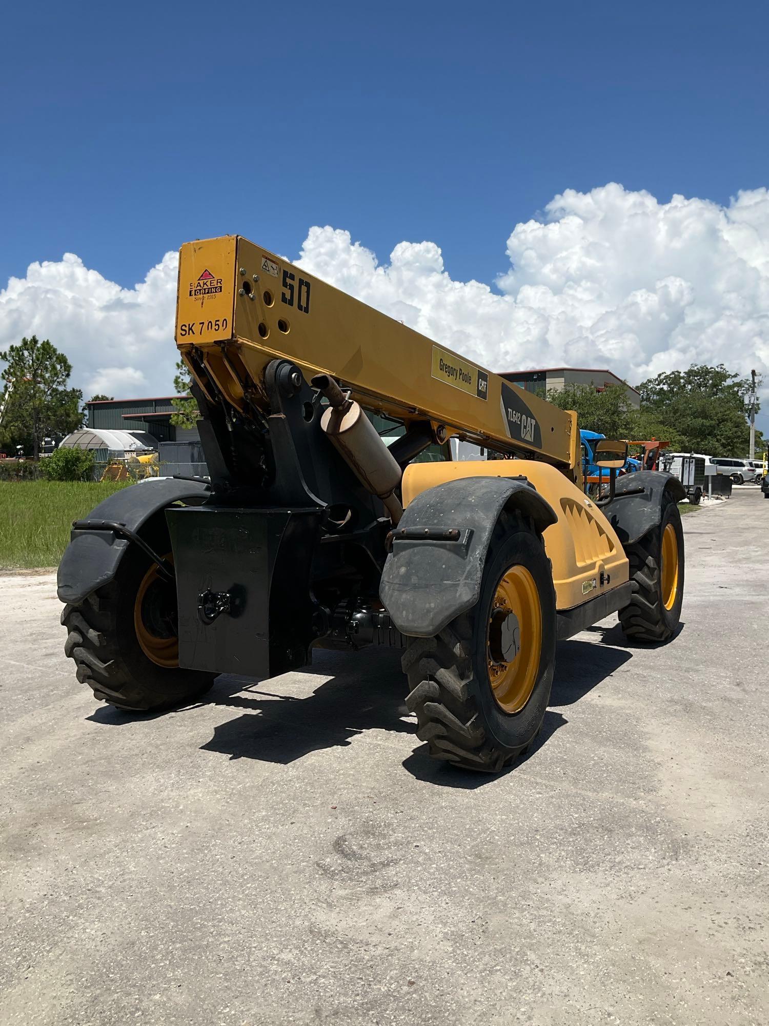 CATERPILLER...TELESCOPIC TELEHANDLER MODEL TL642, DIESEL, APPROX MAX HEIGHT 42FT, APPROX MAX REAC...