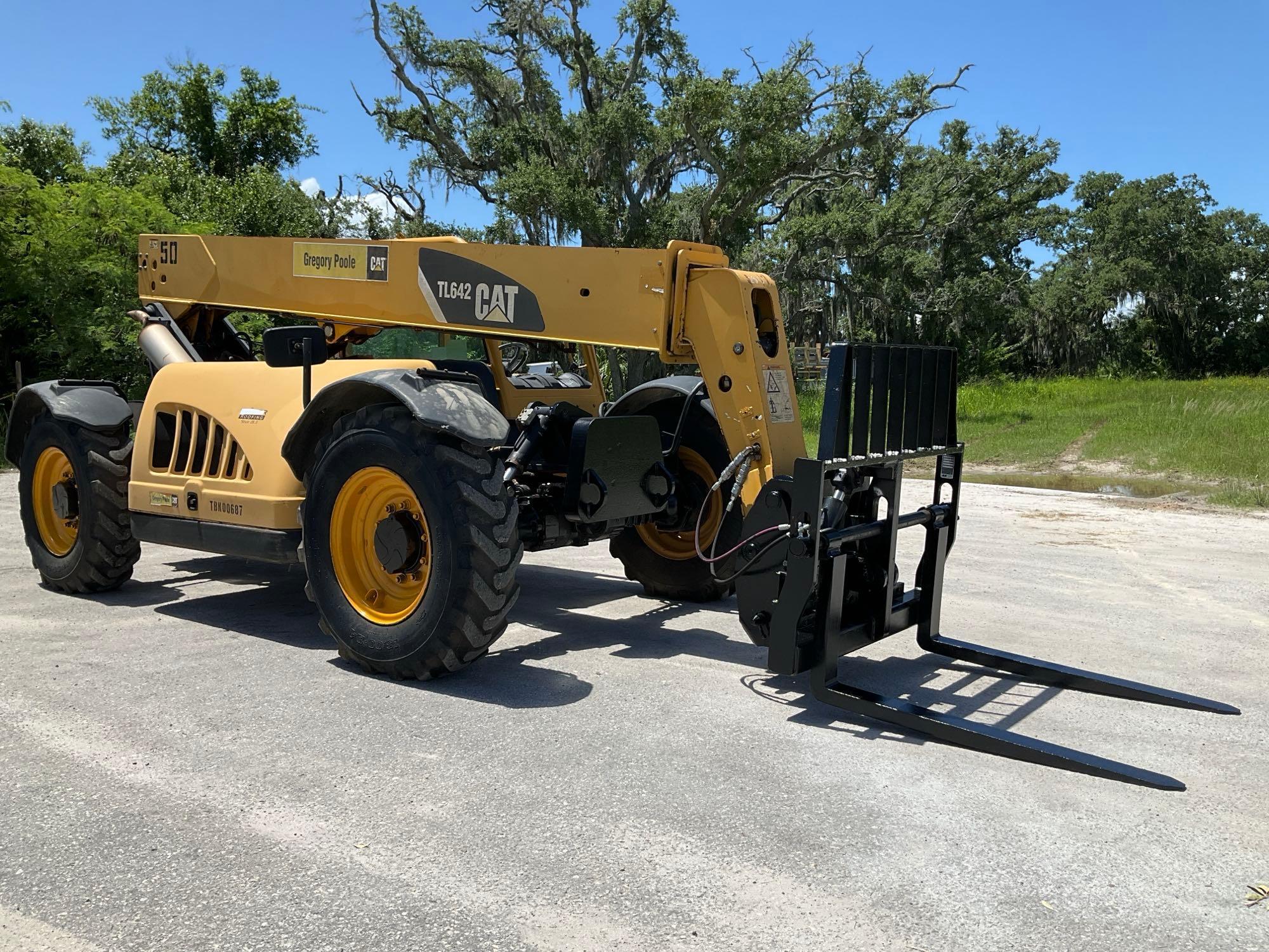 CATERPILLER...TELESCOPIC TELEHANDLER MODEL TL642, DIESEL, APPROX MAX HEIGHT 42FT, APPROX MAX REAC...