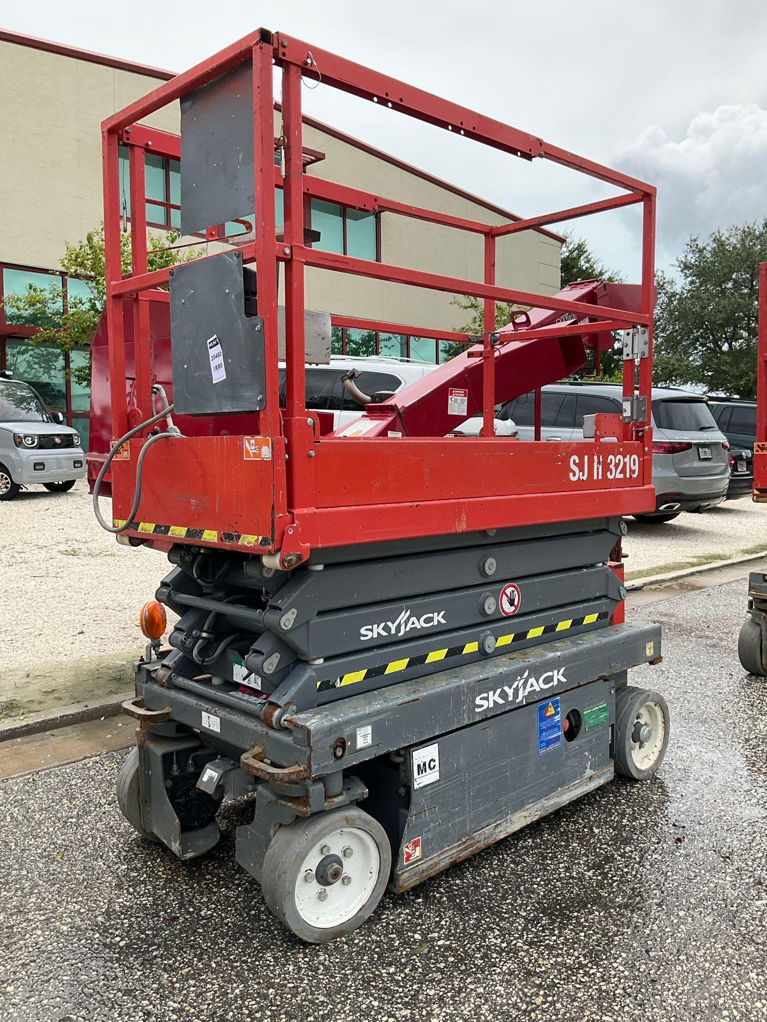 SKYJACK SCISSOR LIFT MODEL SJIII 3219, ELECTRIC, APPROX MAX PLATFORM HEIGHT 19FT, NON MARKING TIR...