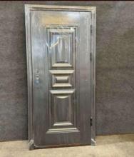UNUSED STEEL SECURITY DOOR WITH FRAME AND HARDWARE,6.89FT H x 3.38FT W