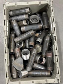 LOT OF METAL PIPE NIPPLES WITH GRAY PLASTIC STORAGE BIN; VARIOUS SIZES , MAKES, & MODELS