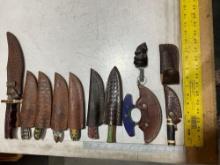 UNUSED (11) HANDMADE DAMASCUS KNIVES IN MOLD PROOF LEATHER SHEATHS, ASSORTED SIZES AND COLORS, ST...