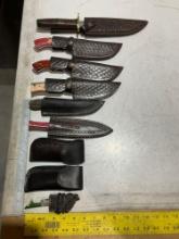 UNUSED (9) HANDMADE DAMASCUS KNIVES IN MOLD PROOF LEATHER SHEATHS, ASSORTED SIZES AND COLORS, STEEL