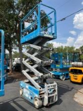 GENIE SCISSOR LIFT MODEL GS1930, ELECTRIC, APPROX MAX PLATFORM HEIGHT 19FT, BUILT IN BATTERY CHAR...