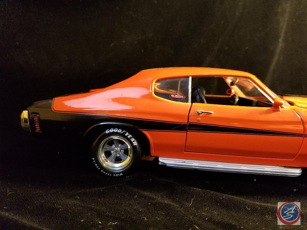Die cast Chevelle SS, orange in color with black racing stripe