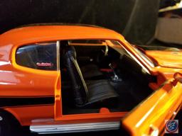 Die cast Chevelle SS, orange in color with black racing stripe
