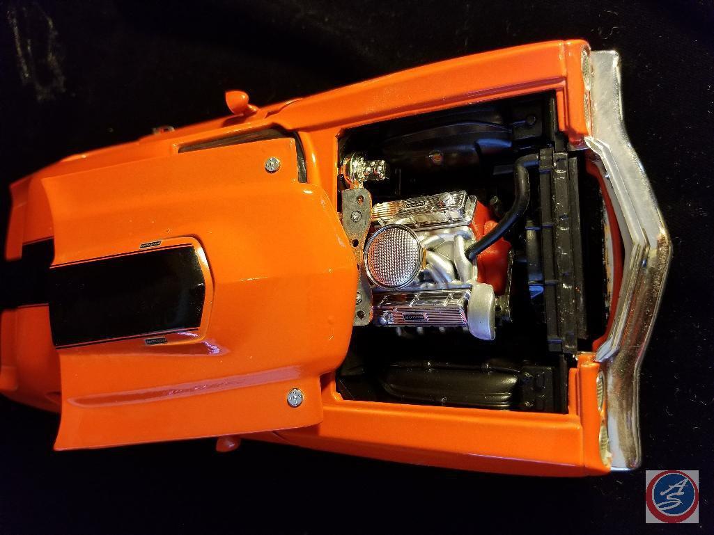 Die cast Chevelle SS, orange in color with black racing stripe