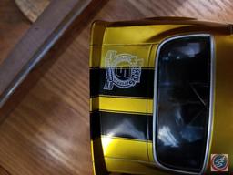 1971 die cast Camaro funny car, gold in color with black racing stripes