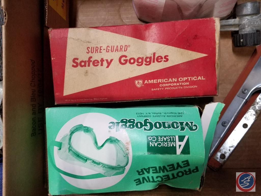 (2) safety goggles, (2) squeegees, Anti-freeze and summer coolant tester, Nu-Pride finishing trowel