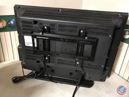 Sanyo 26 inch flatscreen TV on stand with remote (Model #DP26640)