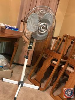 Adjustable single pedestal fan