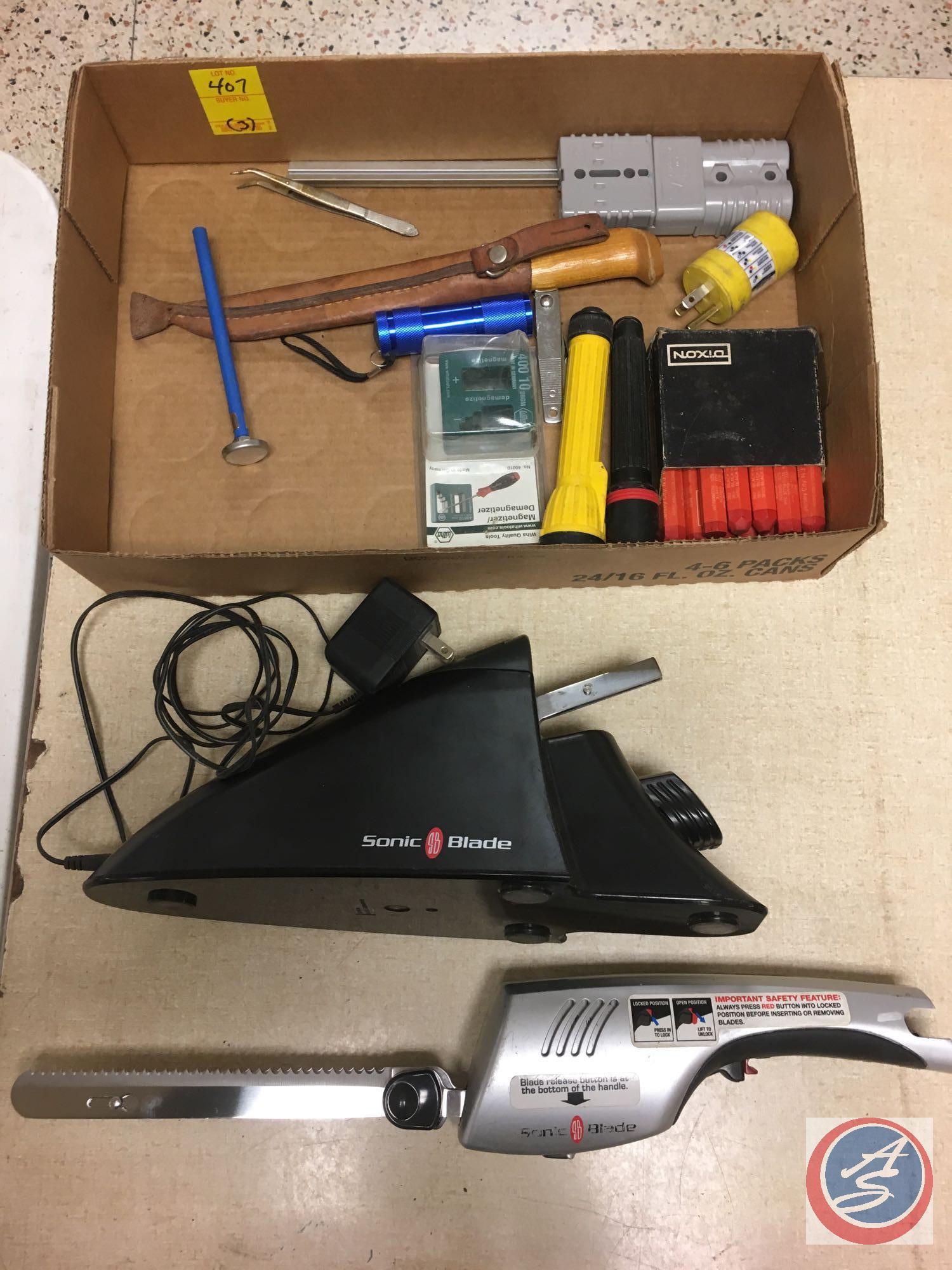 (3) flats containing sonic blade sharpener, Dixon metal pencils, Luma Pro 100 watt light bulb,