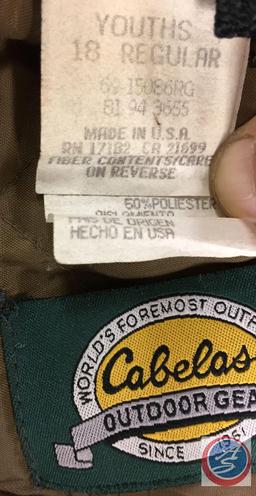Real Tree camo coveralls Y18 regular and a carry bag