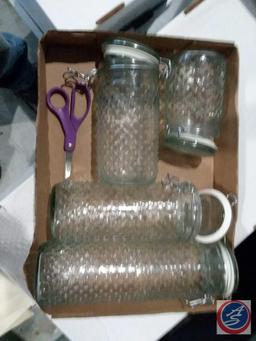 Flat containing 4 piece glass canister set
