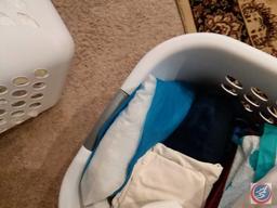 (2) laundry baskets containing pillows, bath linens and pillow cases