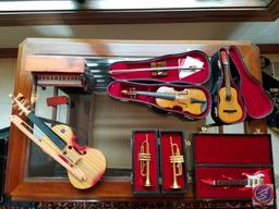 (6) miniature decorative musical instruments