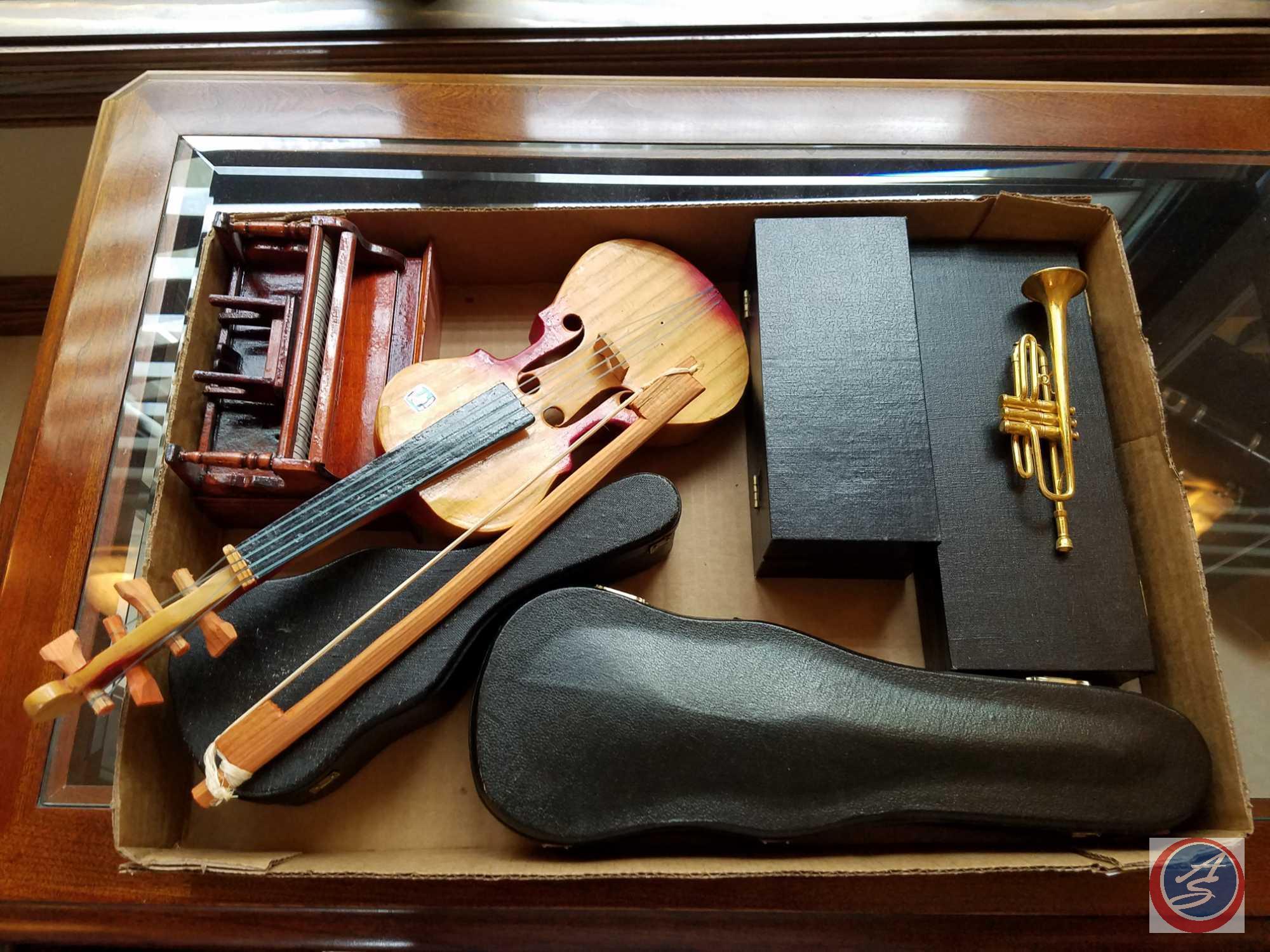 (6) miniature decorative musical instruments