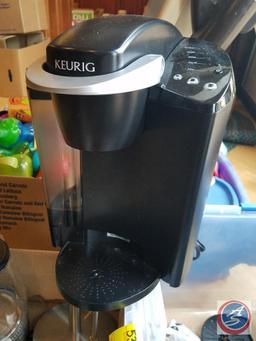 Tote containing; Keurig (model #K40) with K-cup carousel, K-cups, cleaner