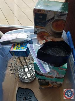 Tote containing; Keurig (model #K40) with K-cup carousel, K-cups, cleaner