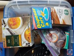 Tote containing; Keurig (model #K40) with K-cup carousel, K-cups, cleaner