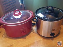 Tote containing; George Forman grilling machine (model DR30), DeLonghi tabletop grill, Rival crock