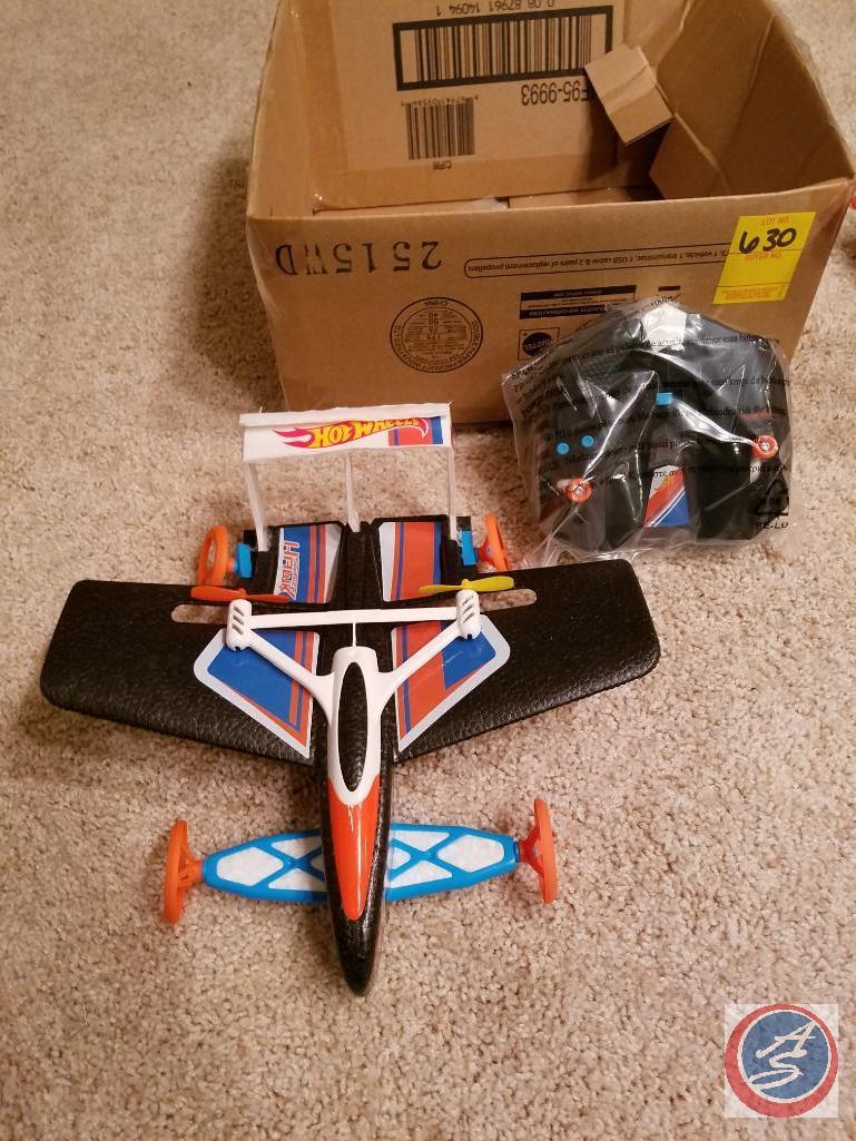 Assortment of misc. remote control toys including an Air Swimmer and Abco Tech color changing