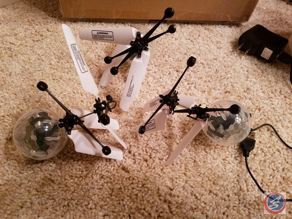 Assortment of misc. remote control toys including an Air Swimmer and Abco Tech color changing
