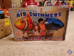 Assortment of misc. remote control toys including an Air Swimmer and Abco Tech color changing