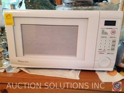 Magic Chef Microwave 1.1 Cu. Ft. Countertop Microwave Oven Model HMD1110W/HMD1110B