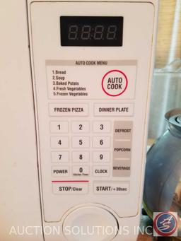 Magic Chef Microwave 1.1 Cu. Ft. Countertop Microwave Oven Model HMD1110W/HMD1110B