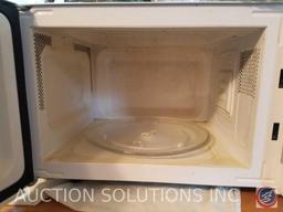 Magic Chef Microwave 1.1 Cu. Ft. Countertop Microwave Oven Model HMD1110W/HMD1110B