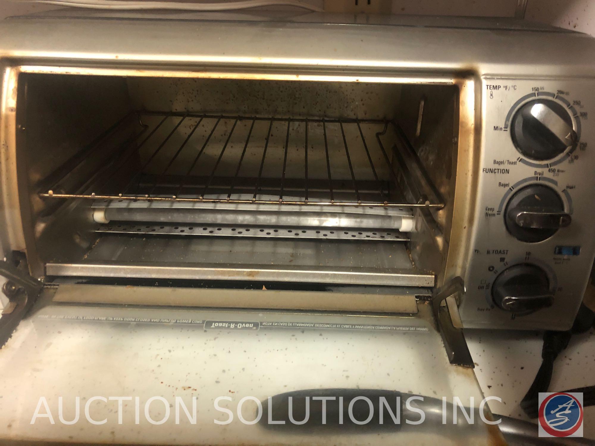 Assorted Glassware, Cookie Sheets, Black and Decker Toaster Oven and Spacemaker Can Opener